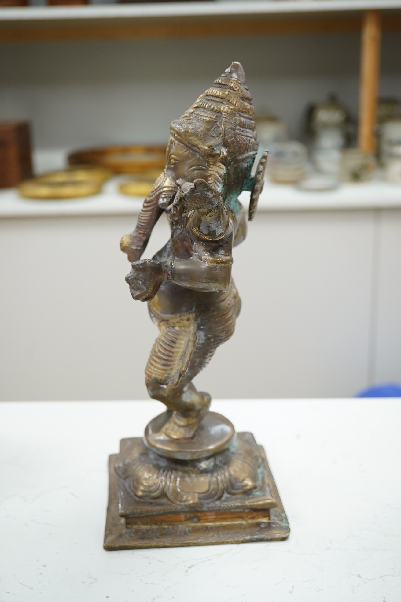 A gilt bronze statue of Ganesh, 30cm high. Condition - fair to good, general wear to the surface